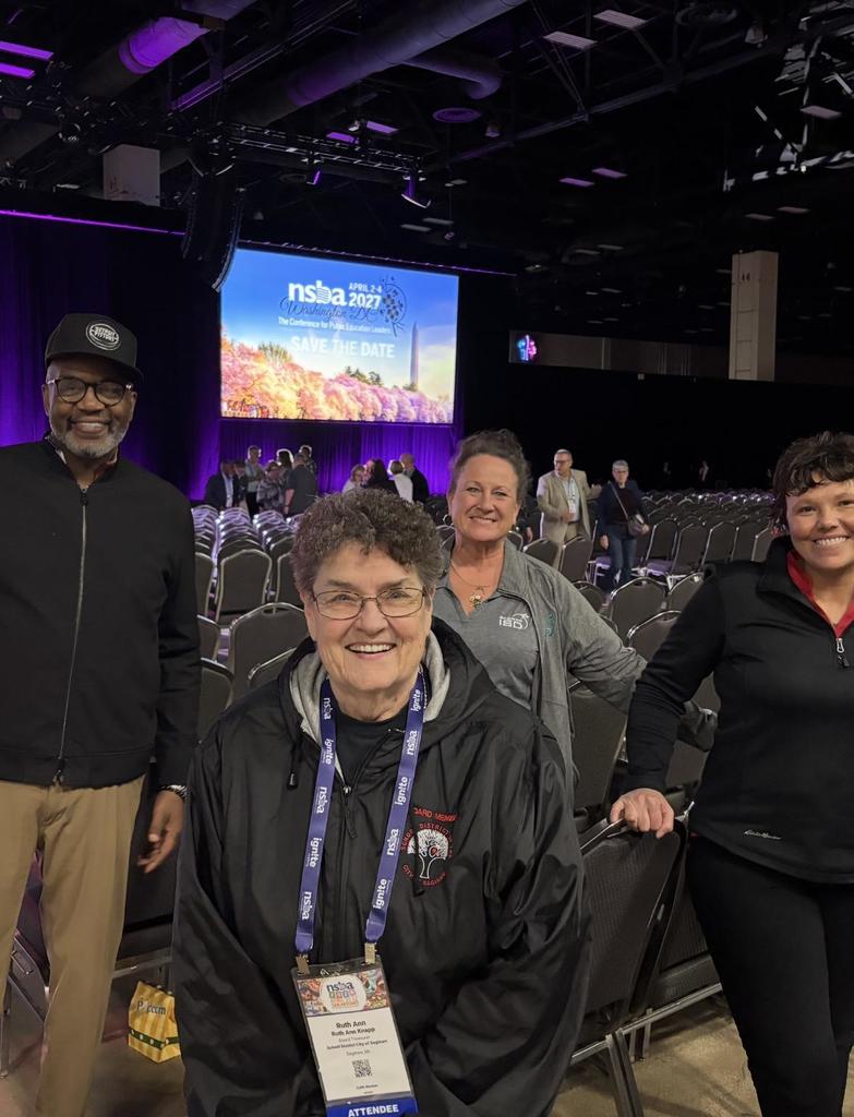 board members smiling together