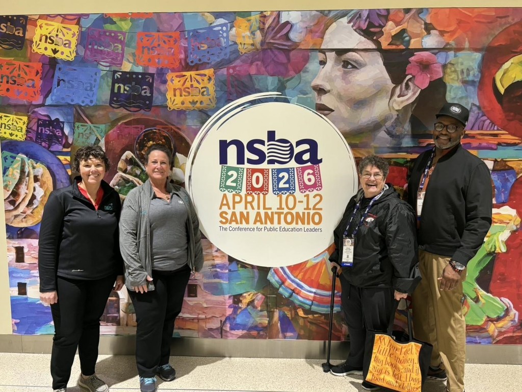 board members smiling together