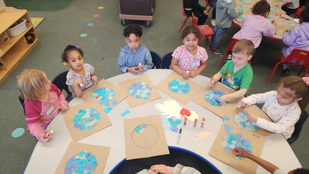 Hard at work decorating our Earth Day bags