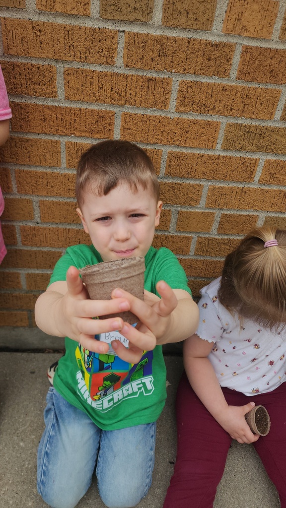 preparing our little starter pots...