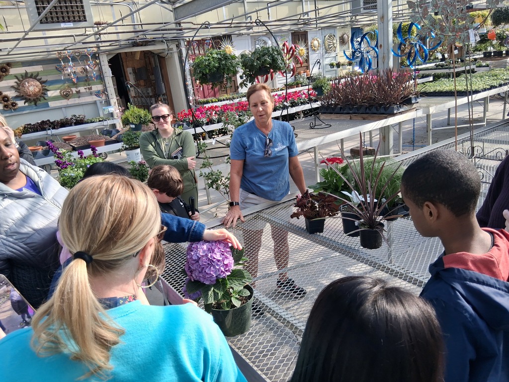 Group of students at greenhouse 