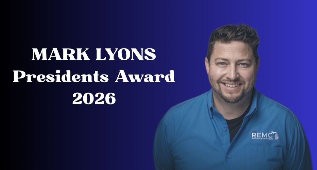 A promotional graphic celebrating Mark Lyons as the recipient of the REMC Association of Michigan President's Award for 2026. The graphic features a blue gradient background with large white text reading "MARK LYONS Presidents Award 2026" on the left. On the right is a smiling portrait of Mark Lyons wearing a blue REMC Association of Michigan button-down shirt. The design highlights his recognition for leadership and contributions to educational technology across Michigan.