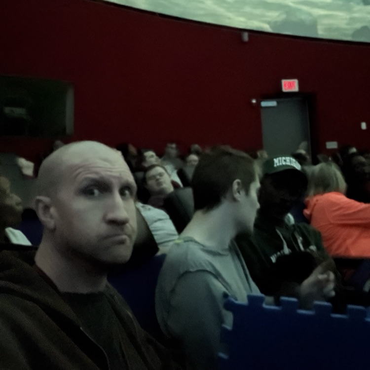 students and staff at the Delta College Planetarium