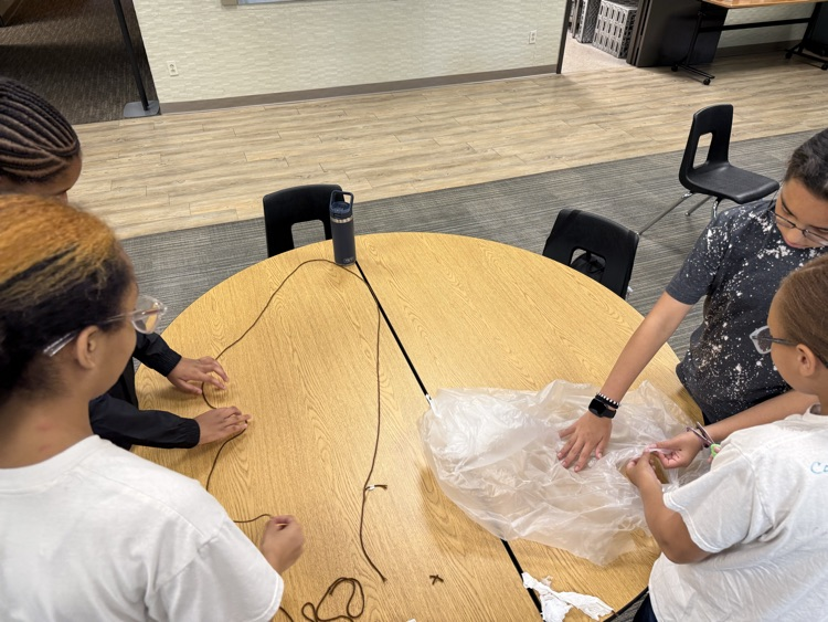 kids building parachutes