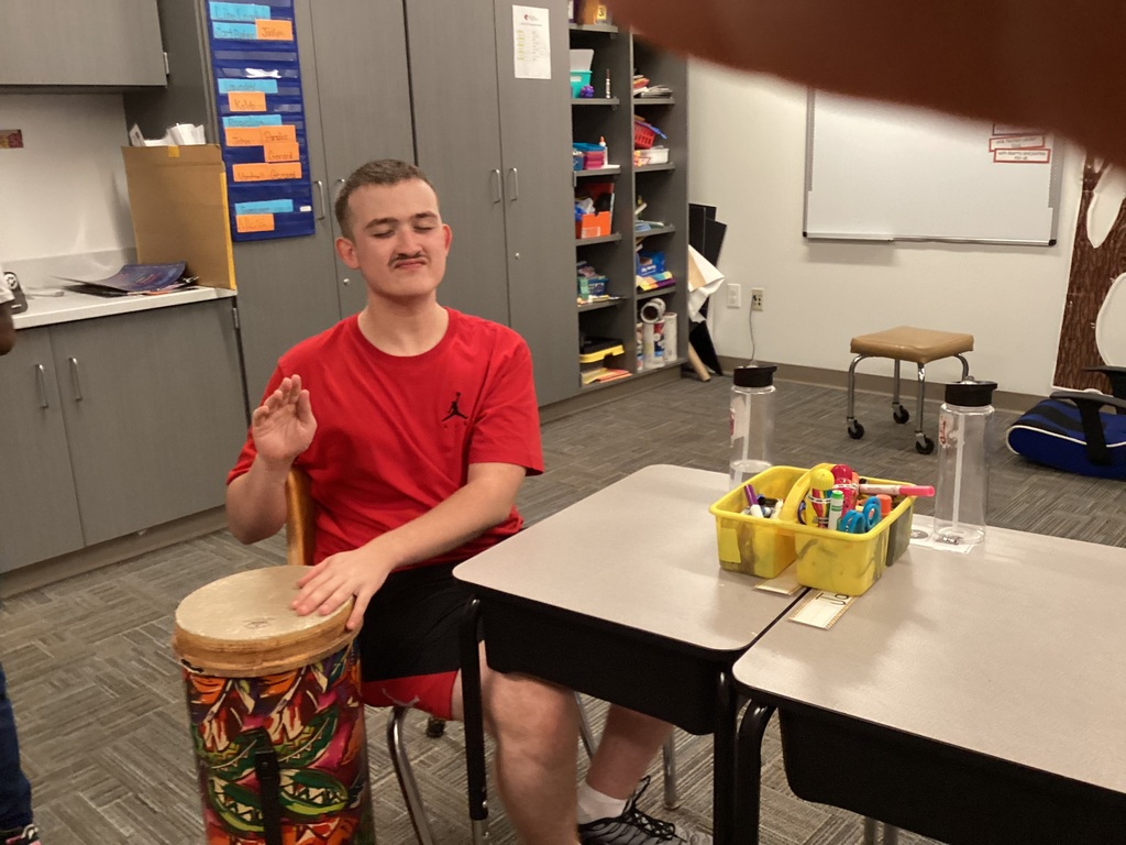 Dylan loves this drum, and he keeps the beat for the whole class