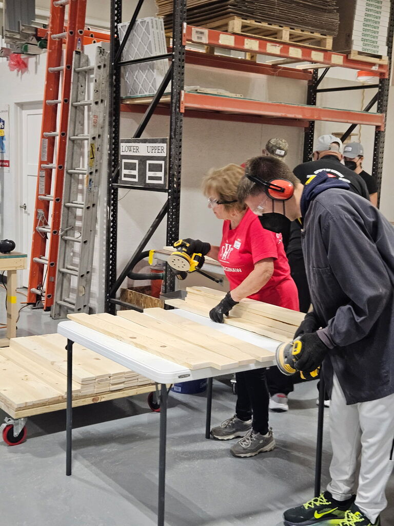 Student sanding wood