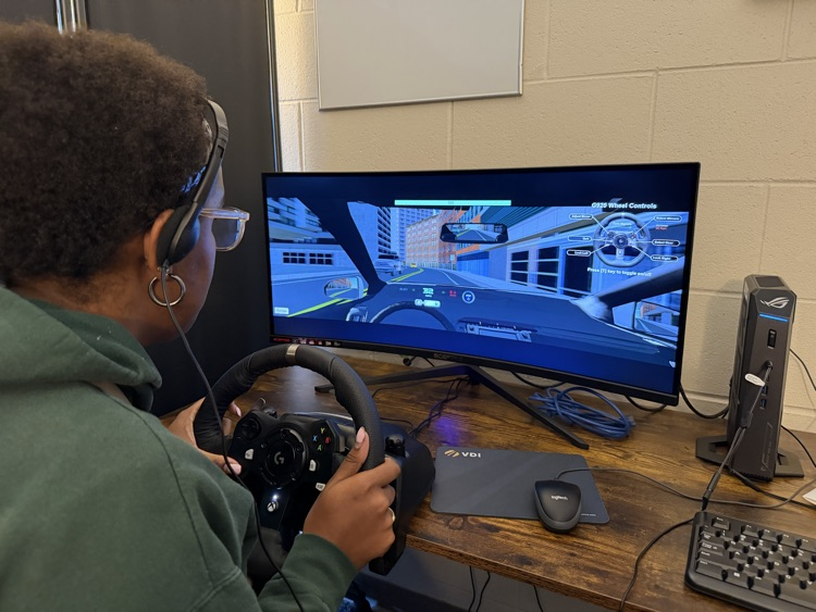 student using driving simulator