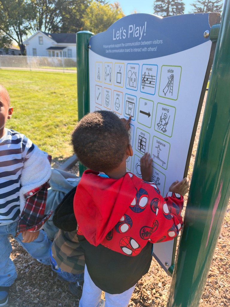 Students using CORE board at recess. 