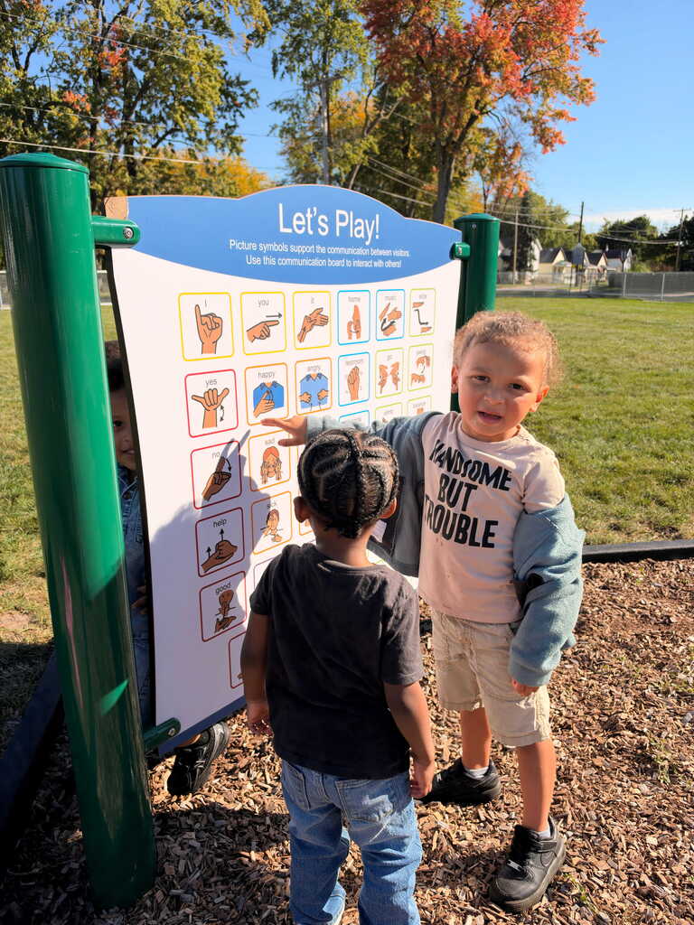 Students using CORE board at recess. 