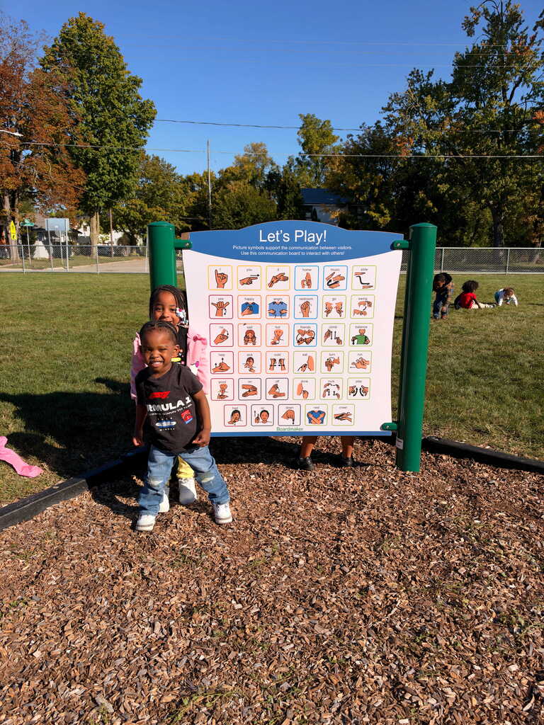 Students using CORE board at recess. 
