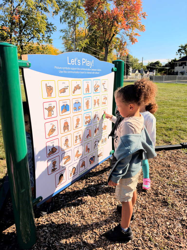 Students using CORE board at recess. 