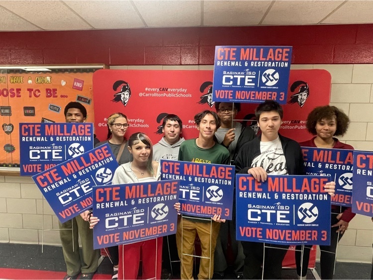 students holding signs