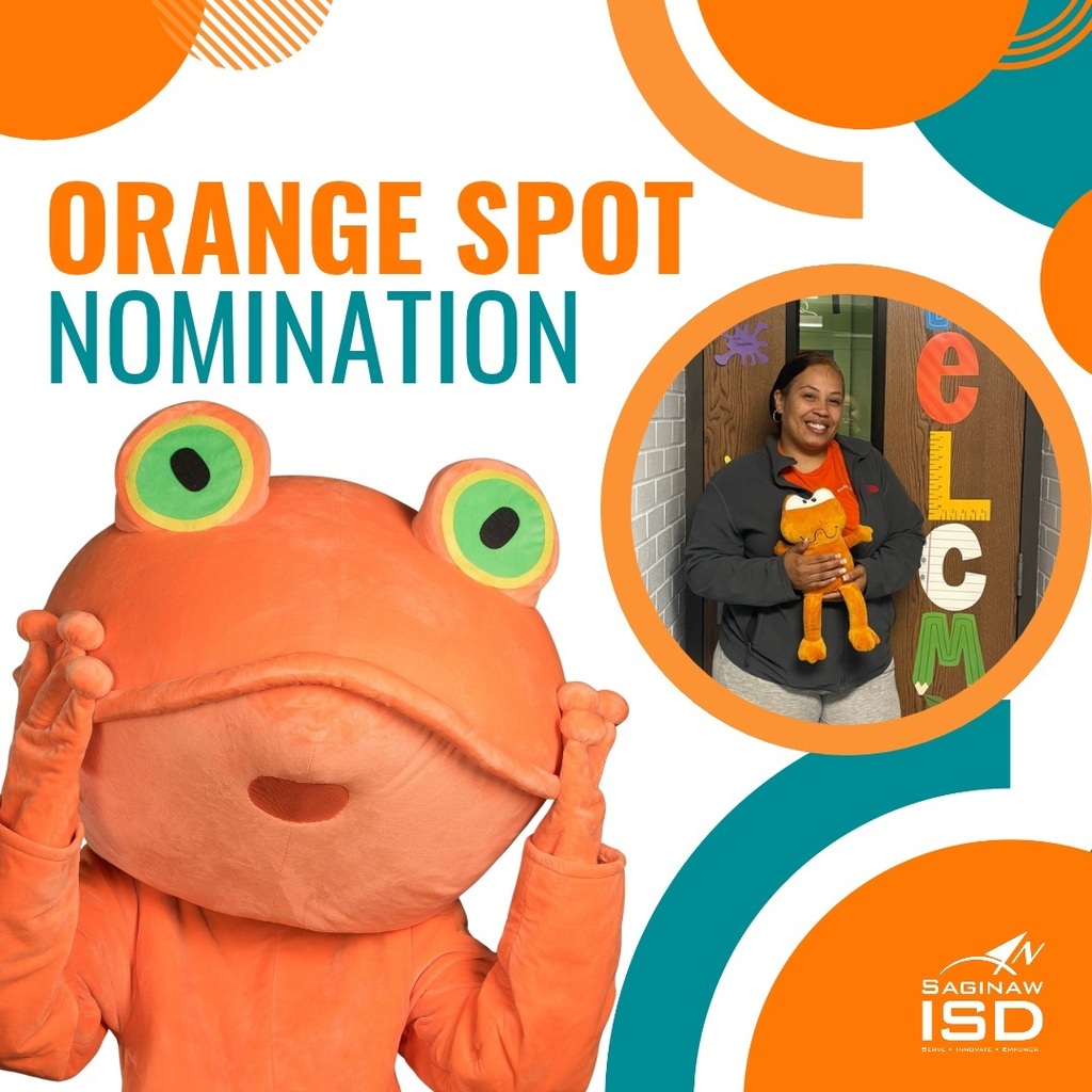 A person in a frog mascot costume holds up a sign that reads "Orange Spot Nomination".