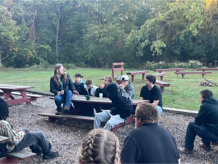 teacher talking to kids