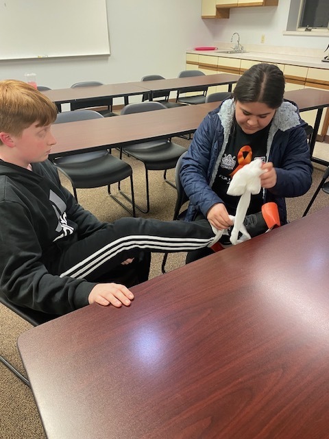 two students splinting an ankle