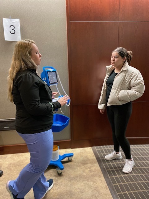 Student talking with Nurse