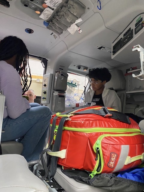 two female students inside the helicopter