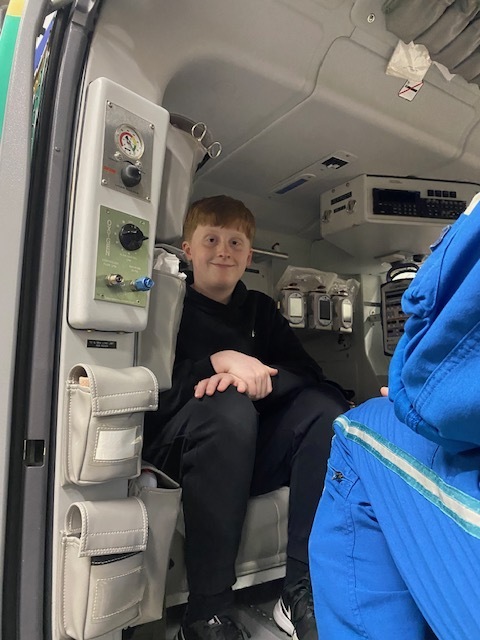 male student inside helicopter