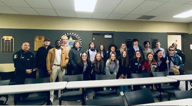 Student ambassadors with the undersheriff and Lt. Rascoe