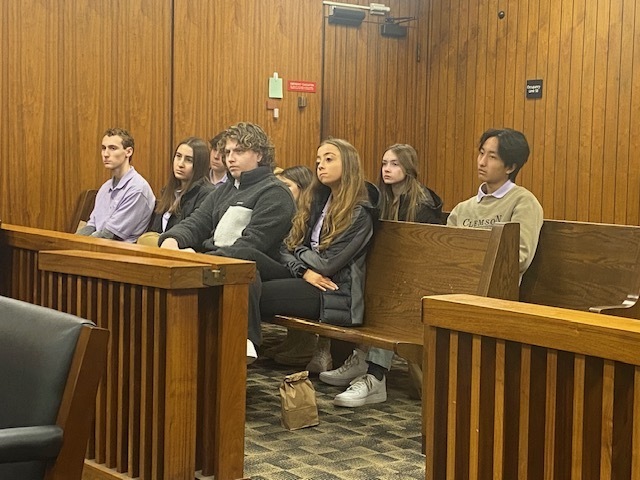 Student ambassadors sitting in the courtroom