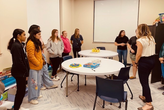 Students learning about mental health activties with children