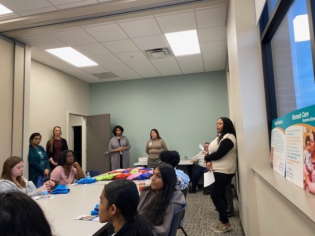 Meeting some of the Great Lakes Bay Health Staff around a conference table