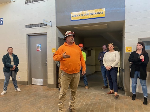 Spence Brother employee talking with counselors