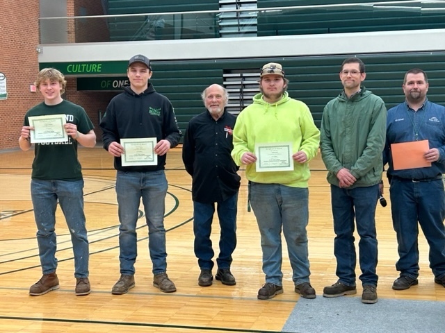 Students with certificates and instructor