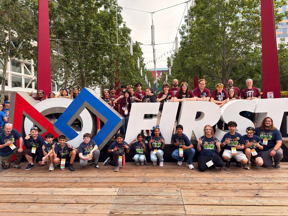 SASA's robotics team pose for picture