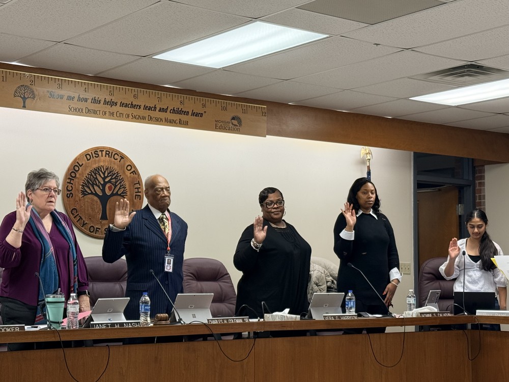 Board members renew oath