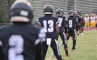 Saginaw United football team on the field