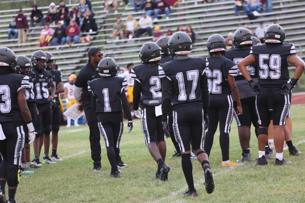 Saginaw United football team on the field