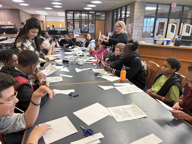 Students make snowflakes
