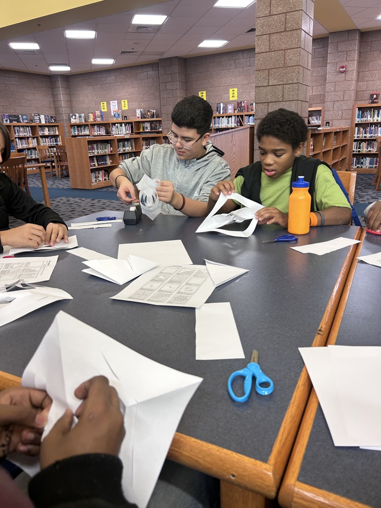 Students make snowflakes
