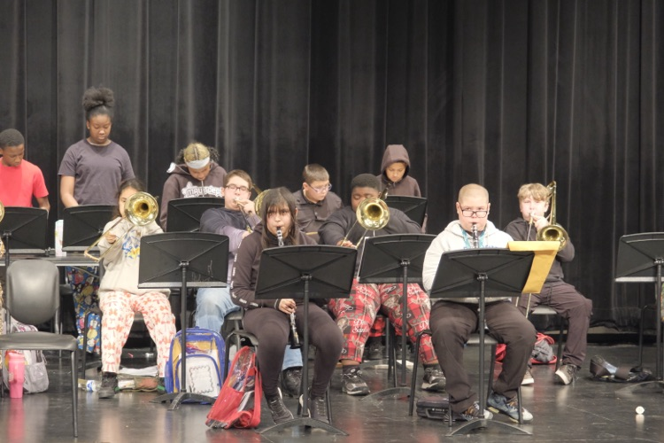 Students play instruments