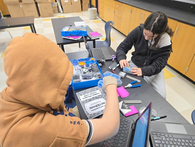 Students work on vex robotics