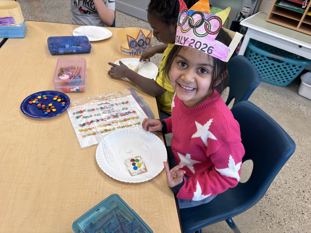 1 student wearing a paper olympic crown