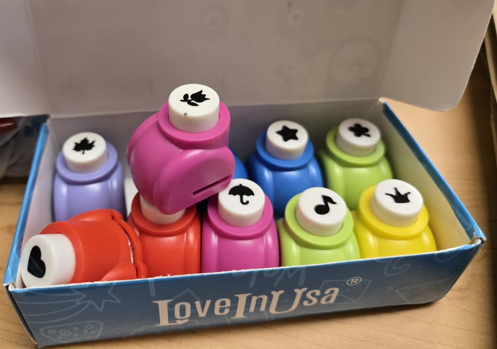 different colored/shape hole punches