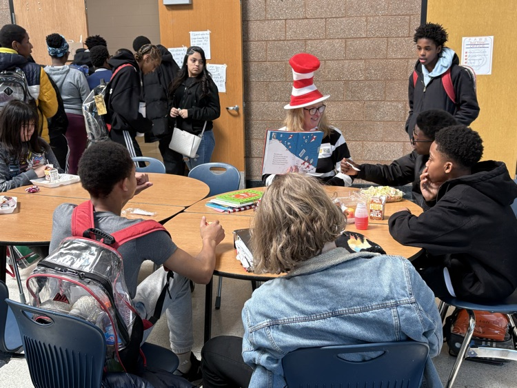 Mrs. Kolobaric reading Dr Seuss to students