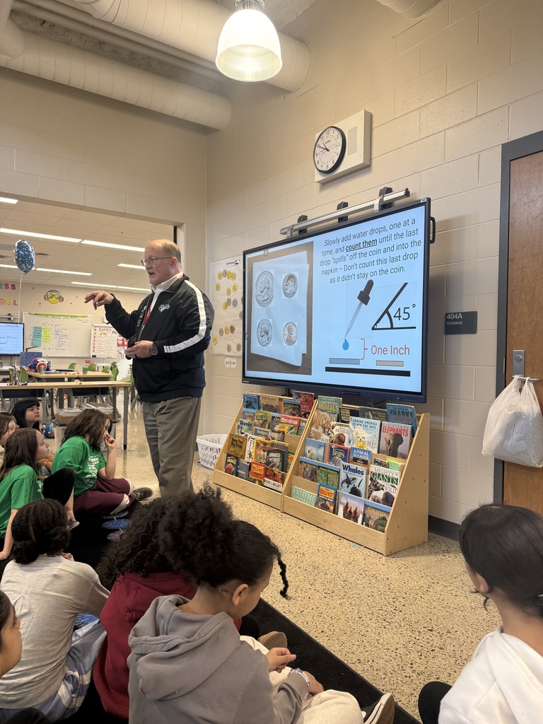 principal talking in front of students