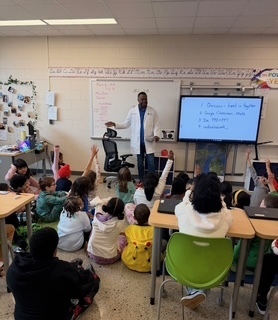doctor standing in front of a class 