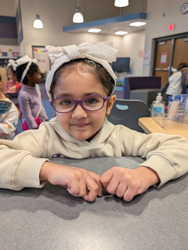 child wearing toilet paper headband