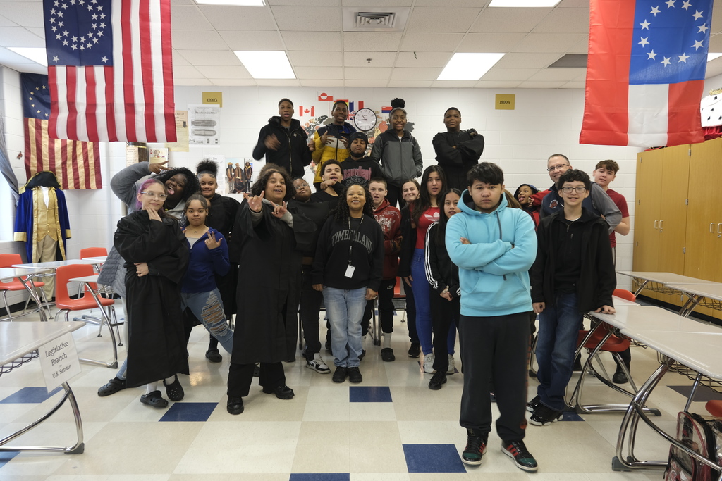 Students celebrate passing their first bill in history class