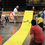 derby cars going down a ramp