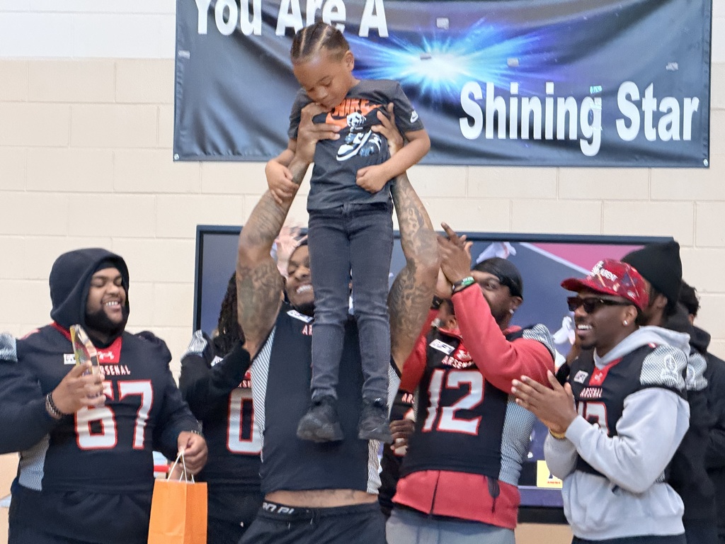 Michigan Arsenal football team visit Loomis students' assembly