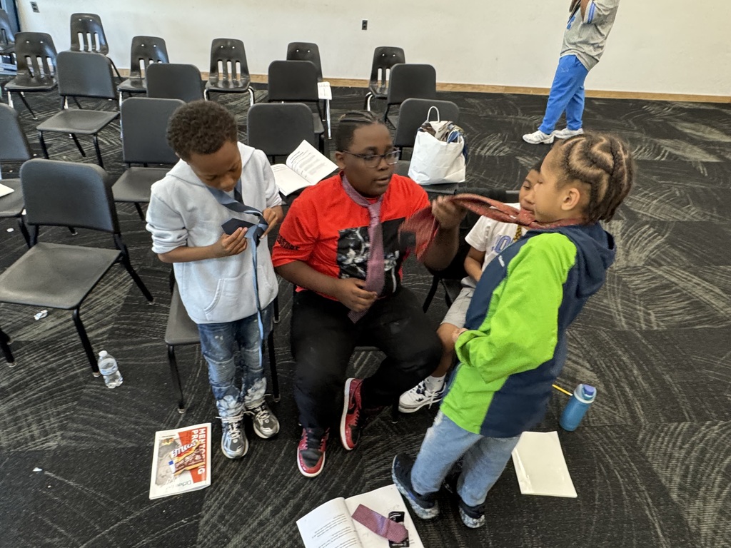 Student graduates of the Power of Dad mentorship program at Saginaw Middle School