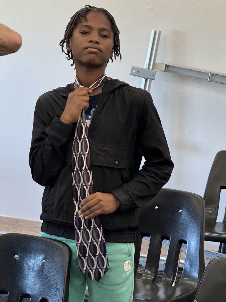 Student graduates of the Power of Dad mentorship program at Saginaw Middle School
