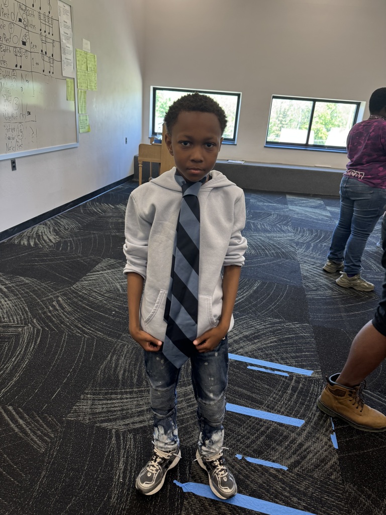 Student graduates of the Power of Dad mentorship program at Saginaw Middle School