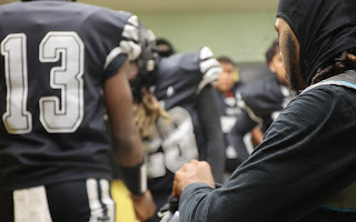 Saginaw United football team on the field