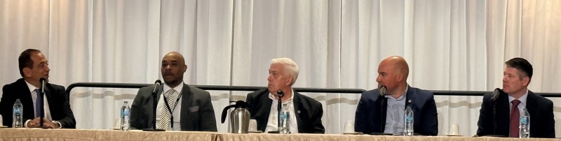Dr. Roberst talking during a panel discussion